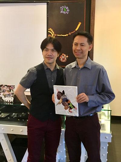 Dr. Huy Hoang raced to be the first to finish his collage.